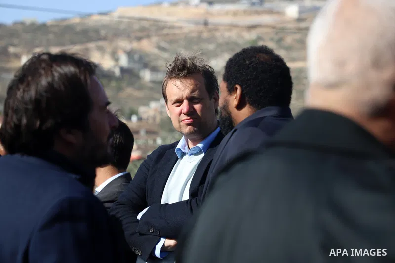 Diplomatic representatives visit schools in al-Lubban al-Sharqiya village, in the West Bank city of Nablus, on December 8, 2021. Many times, Israeli settlers prevented Palesinian students from going to schools in al-Lubb...