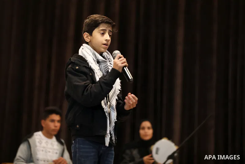 Palestinians attend musical show marking International Human Rights Day, in Gaza city on December 9, 2021. Photo by Majdi Fathi