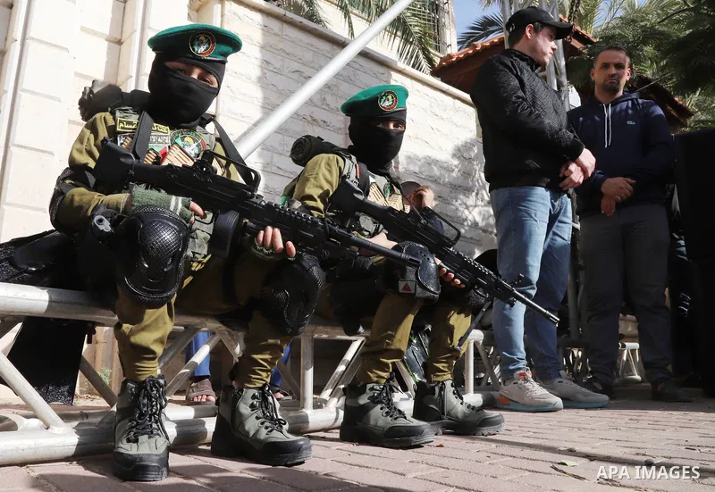 Palestinian Hamas supporters take part during a rally marking the 34th anniversary of the founding of the Hamas movement, in Gaza city on December 10, 2021. Photo by Omar Ashtawy