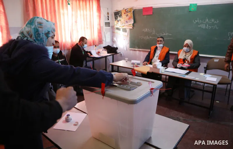Palestinian voters cast their vote in the first phase of local elections in the West Bank city of Hebron on December 11, 2021. Polls opened this morning for the first phase of local elections at 154 Palestinian localitie...