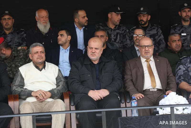 Members of Palestinian security forces take part in a graduation ceremony in Gaza City December 12, 2021. Photo by Ashraf Amra Head of government administration in Gaza Strip, Essam Al-Dalis attends a graduation ceremony...