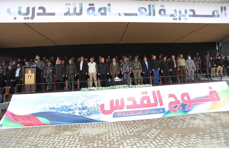 Members of Palestinian security forces take part in a graduation ceremony in Gaza City December 12, 2021. Photo by Ashraf Amra