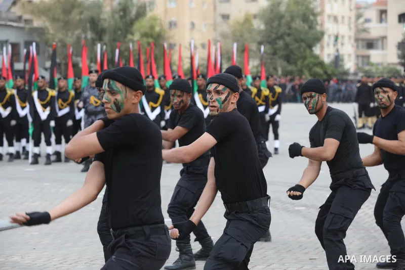 Members of Palestinian security forces take part in a graduation ceremony in Gaza City December 12, 2021. Photo by Ashraf Amra