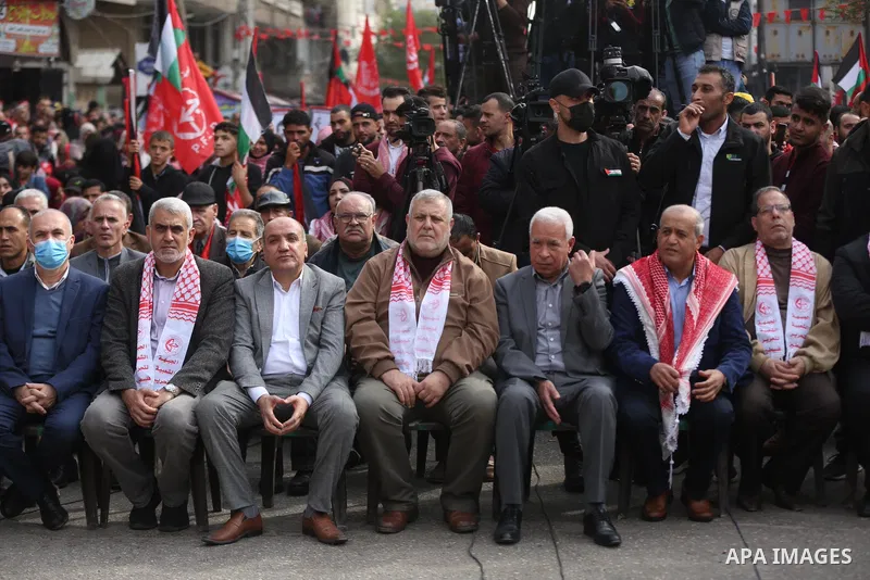 Palestinian supporters of the Popular Front for the Liberation of Palestine (PFLP) take part during a rally marking the 54th anniversary of its founding in Gaza City on December 13, 2021. Photo by Ashraf Amra