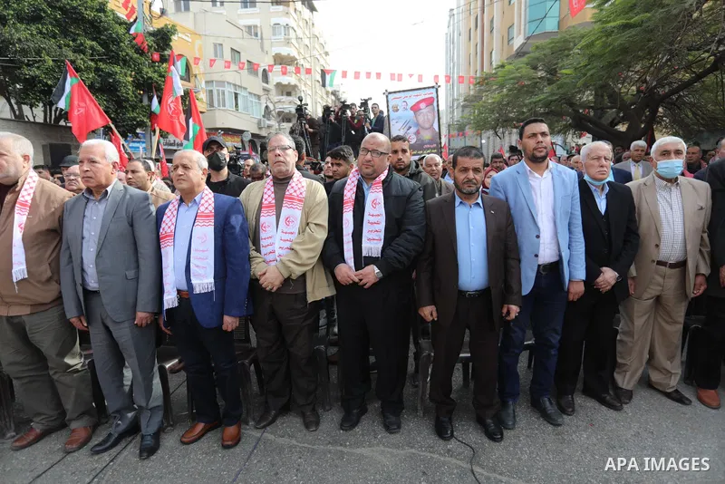 Palestinian supporters of the Popular Front for the Liberation of Palestine (PFLP) take part during a rally marking the 54th anniversary of its founding in Gaza City on December 13, 2021. Photo by Ashraf Amra