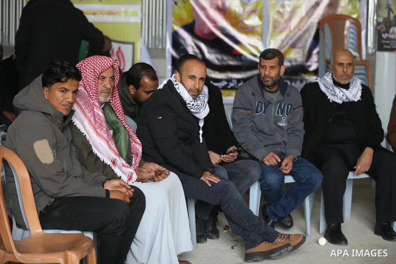 Palestinian relatives of the released prisoner Hussein Al Zuraei celebrate his release from Israeli jails after spending 19 years in prison, Deir Al Balah in the center of Gaza strip, on December 21, 2021. Photo by Ashra...