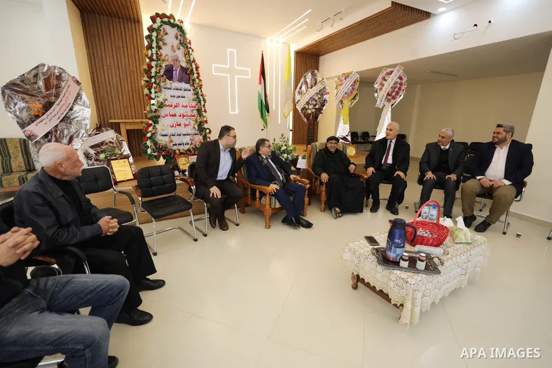 Palestinian delegation from Hamas visit the Roman Catholic Church of the Holy Family in Gaza city on December 28, 2021. Christmas is an annual festival commemorating the birth of Jesus Christ. Photo by Mahmoud Nasser