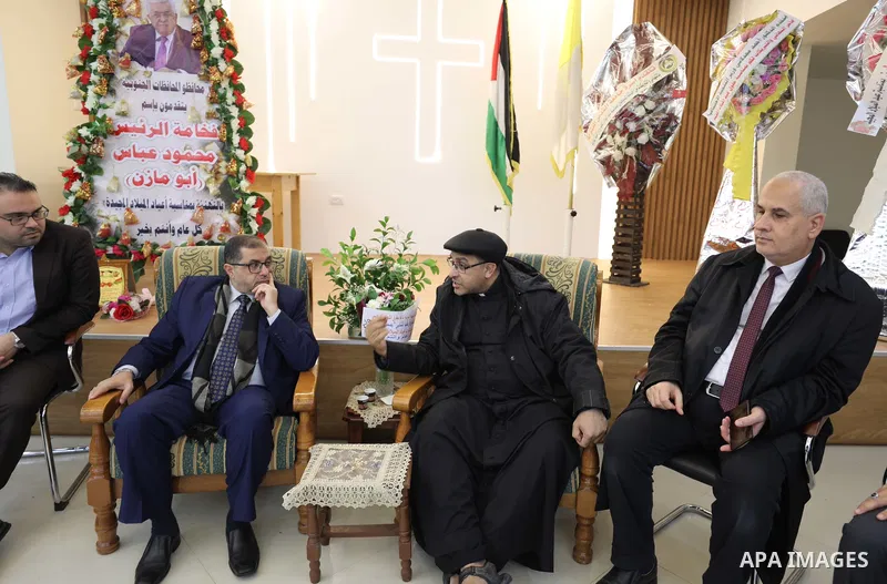Palestinian delegation from Hamas visit the Roman Catholic Church of the Holy Family in Gaza city on December 28, 2021. Christmas is an annual festival commemorating the birth of Jesus Christ. Photo by Mahmoud Nasser
