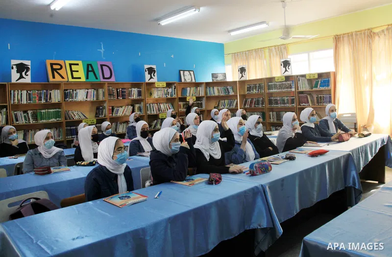 Palestinian teacher Lina Khalifeh, studies at Zahrat Al-Madaen School in Gaza City on November 06, 2021. The teacher Lina won the title of “Best Global Achievement for the Year 2021” from the EDUKOS UNITE Foundation in I...