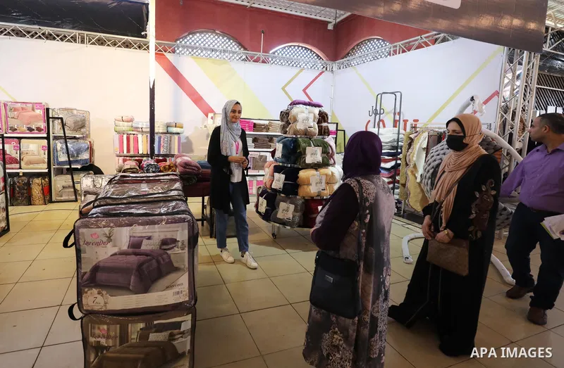 Palestinians attend an exhibition entitled "Palestinian mirrors" in Gaza City, on November 10, 2021. Palestinian handicrafts are handicrafts produced by Palestinian people. A wide variety of handicrafts, many of which ha...