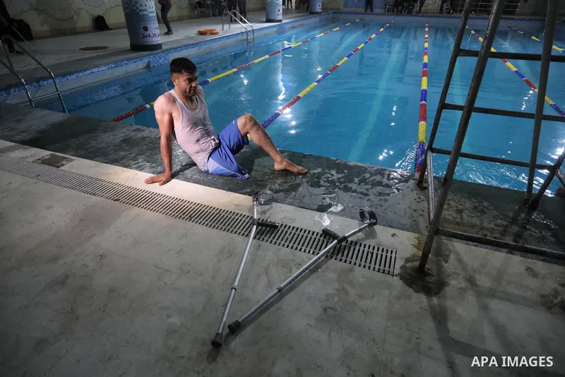 Palestinian amputees take part in a swimming championship at al-Sadaka Club in Gaza City November 14, 2021. Almost 50,000 Palestinians are classified as "disabled" among the 2-million population of the blockaded Gaza Str...