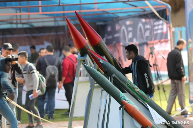 Palestinians attend the military and historical exhibition to mark the nine anniversary of Ahmed al-Jabari death, the late leader of Ezzedine al-Qassam Brigades, the armed wing of the Palestinian Hamas movement in Gaza C...