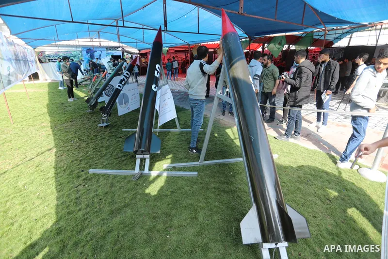 Palestinians attend the military and historical exhibition to mark the nine anniversary of Ahmed al-Jabari death, the late leader of Ezzedine al-Qassam Brigades, the armed wing of the Palestinian Hamas movement in Gaza C...