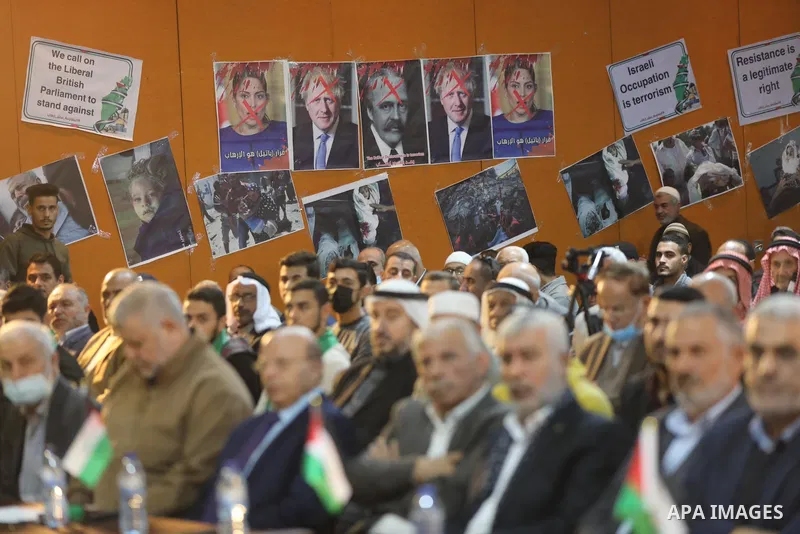Palestinians take part in a rally against the British Home Secretary Priti Patel decision to ban Hamas, in Gaza City on November 23, 2021. Showing support for Hamas in Britain could be punished with 14 years in prison if...