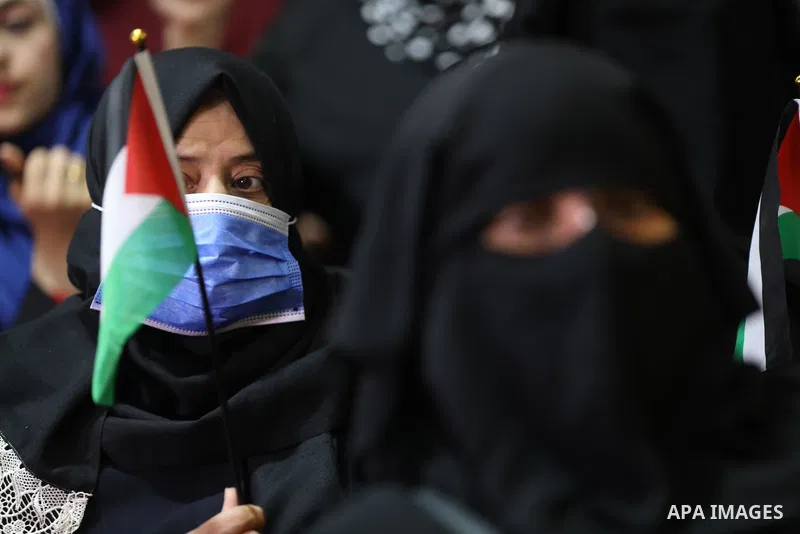 Palestinians take part in a rally against the British Home Secretary Priti Patel decision to ban Hamas, in Gaza City on November 23, 2021. Showing support for Hamas in Britain could be punished with 14 years in prison if...