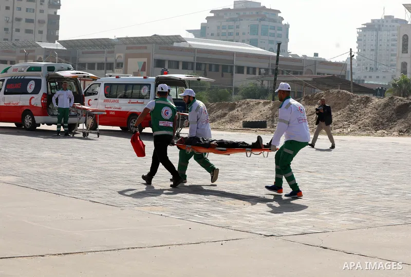 Palestinian ambulance officers show their skills during a graduation ceremony, in Gaza city on November 25, 2021. Photo by Ramadan El-Agha