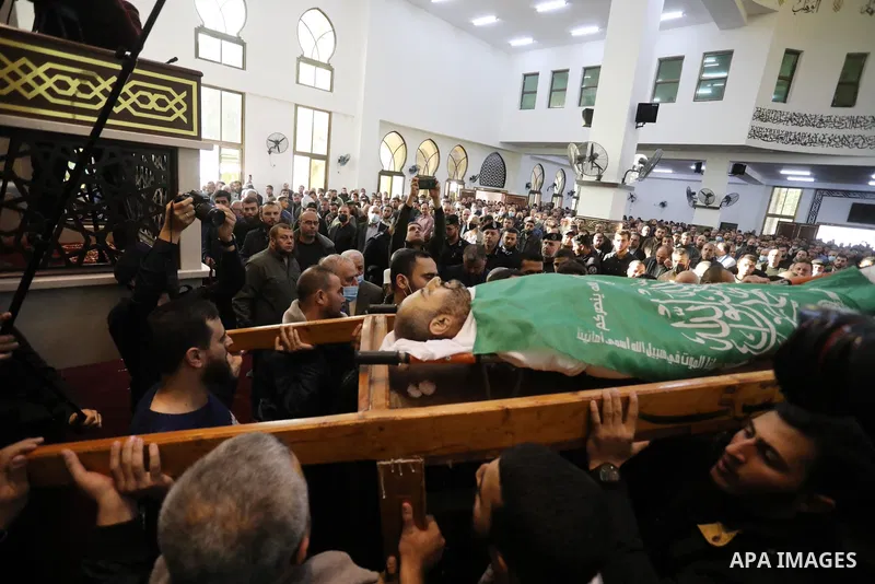 Palestinians attend the funeral of Hamas leader Abd al-Salam Siam who died of the coronavirus (COVID-19) pandemic in Gaza City, on November 29, 2021. Photo by Ashraf Amra