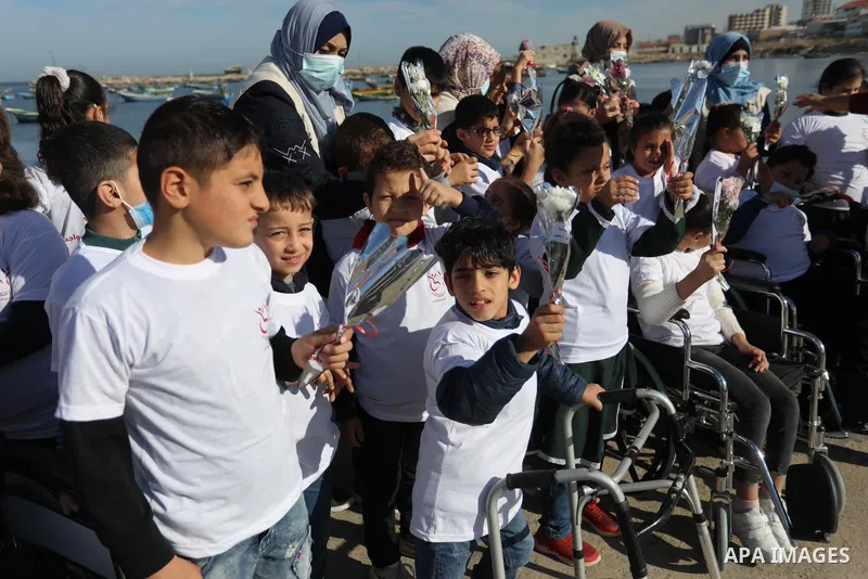 Palestinian children with disabilities take part in an event on the International Day of Disabled Persons at Gaza port on November 30, 2021. The annual observance of the International Day of Disabled Persons was proclaim...