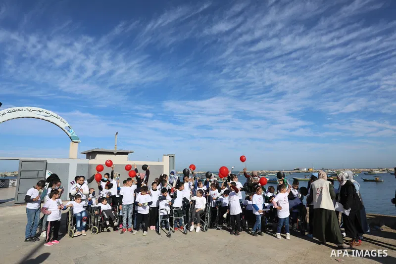 Palestinian children with disabilities take part in an event on the International Day of Disabled Persons at Gaza port on November 30, 2021. The annual observance of the International Day of Disabled Persons was proclaim...