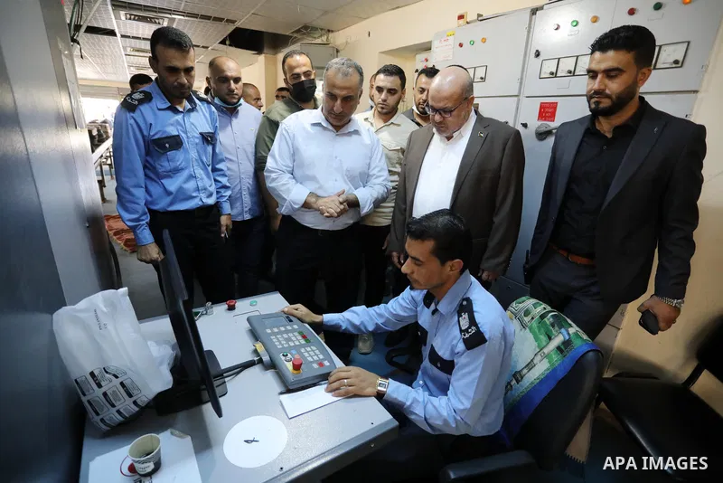 Head of government administration in Gaza Strip, Essam Al-Dalis makes an inspection tour of the Rafah crossing between the Gaza Strip and Egypt, before he cross the border to Egypt, in southern Gaza strip on October 3, 2...