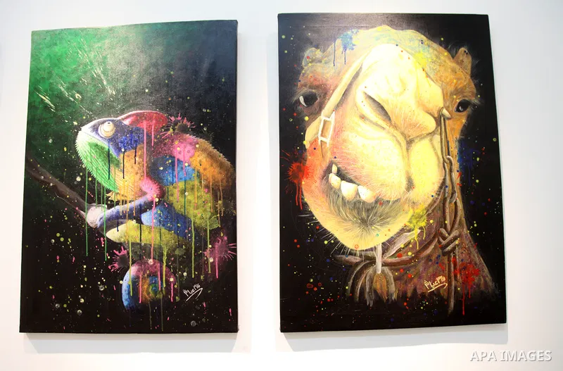 Palestinian artist Faris Ayyash, displays his photos and sculptures entitled "The Other Side" at an exhibition, in Gaza city, on October 05, 2021. Plastic arts are art forms which involve physical manipulation of a plast...