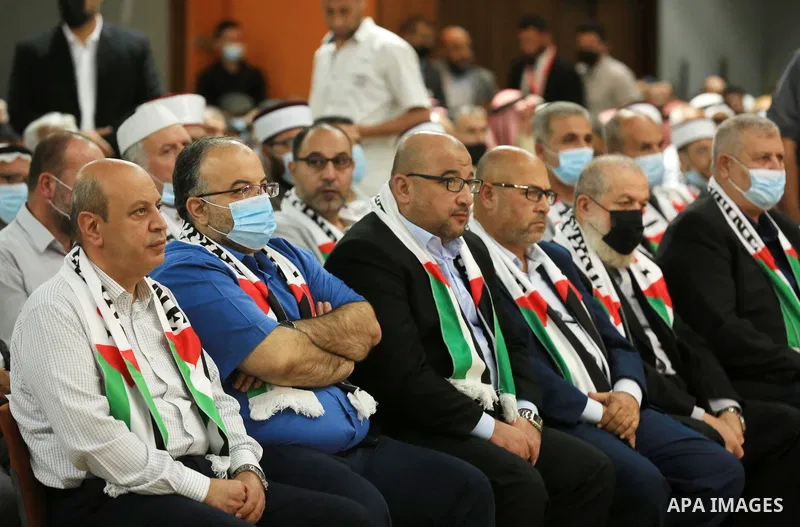 Palestinians attend a celebration marking the 34th anniversary of the founding of the Islamic Jihad movement, in Gaza city on October 6, 2021. Photo by Ashraf Amra