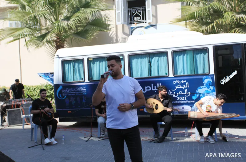 Palestinian members of musical band from "Edward Said National Conservatory of Music" perform in a festival of "Sea and Freedom" at Al-Amal Institute for Orphans, in Gaza city on October 9, 2021. The Gaza Strip has been...
