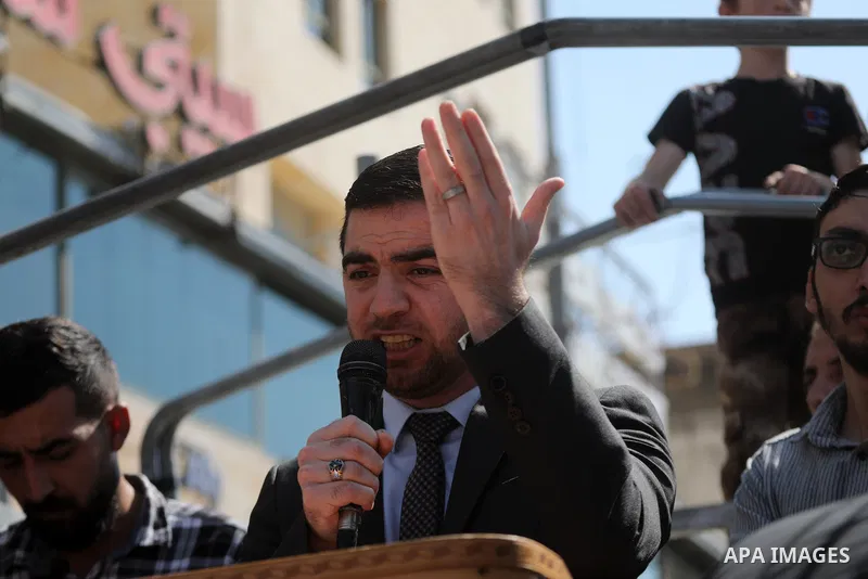 Palestinian supporters of Hizb ut-Tahrir or the Islamic Liberation Party of the Islamic Liberation Party march demanding a ban on Jewish prayer at Al-Aqsa mosque in the West Bank town of Hebron, on October 09, 2021. An I...