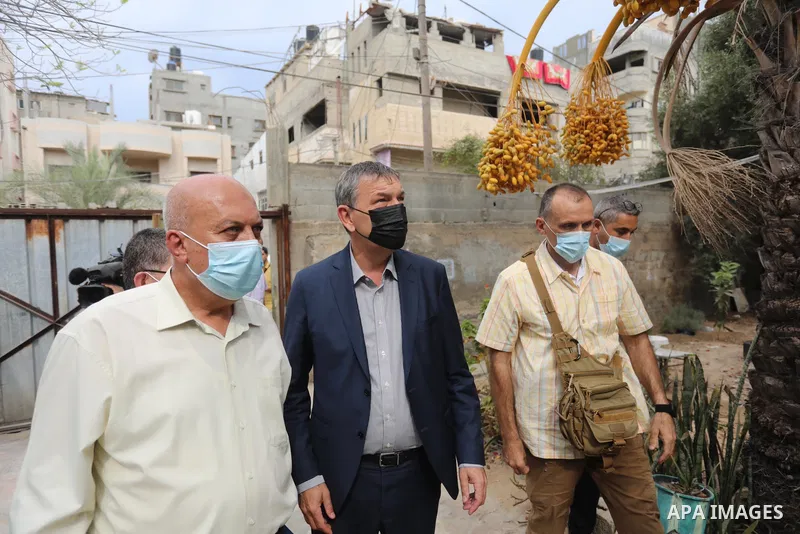 The Commissioner-General of UNRWA, Philippe Lazzarini, visits the Salmiya family house which was hit by Israeli strikes during the recent 11-day conflict between Israel and Hamas on May, at Al-Shati refugee camp, in Gaza...