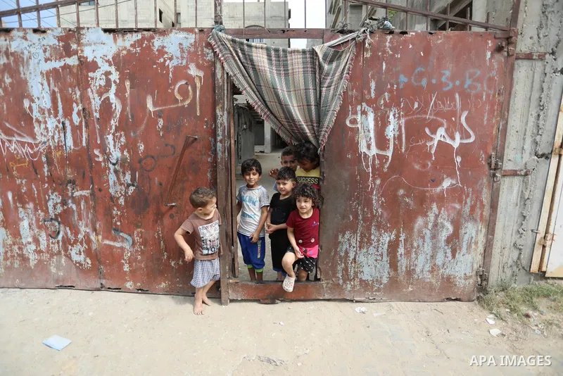 Palestinian children play at Al-Shati refugee camp, in Gaza city on October 12, 2021. The Framework for Cooperation states, “The US will not make any contributions to UNRWA except on the condition that UNRWA takes all fe...