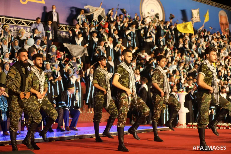 Palestinian students from al-Azhar University attend their graduation ceremony, in Gaza city on October 12, 2021. Photo by Ashraf Amra