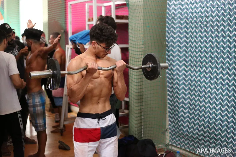 Palestinian bodybuilders take part in Physique and Bodybuilding competition organized by the Palestinian union of Bodybuilding and Fitness, in Gaza city on October 15, 2021. Photo by Ashraf Amra