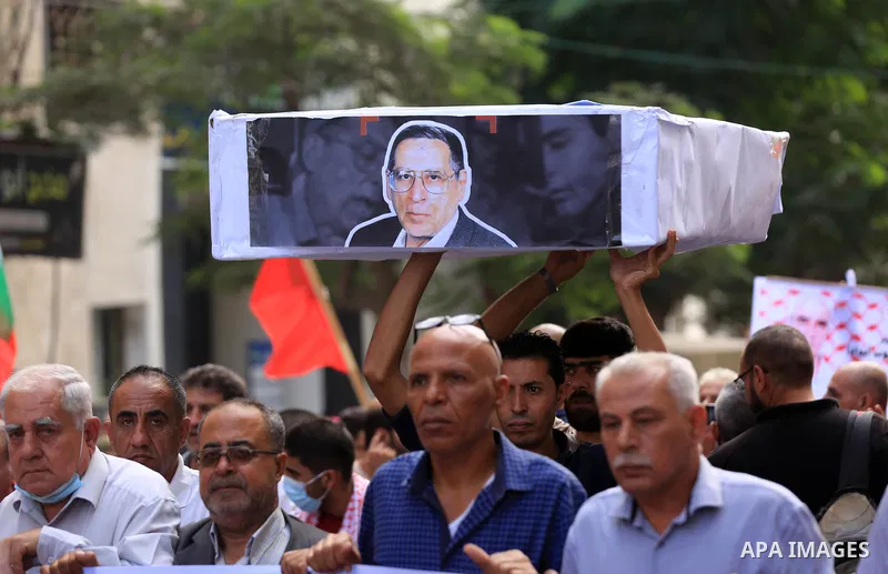 Palestinian supporters of the Popular Front for the Liberation of Palestine take part in a protest on the anniversary of the17th of October, in front of Red cross office in Gaza, on October 17, 2021. Photo by Ashraf Amra