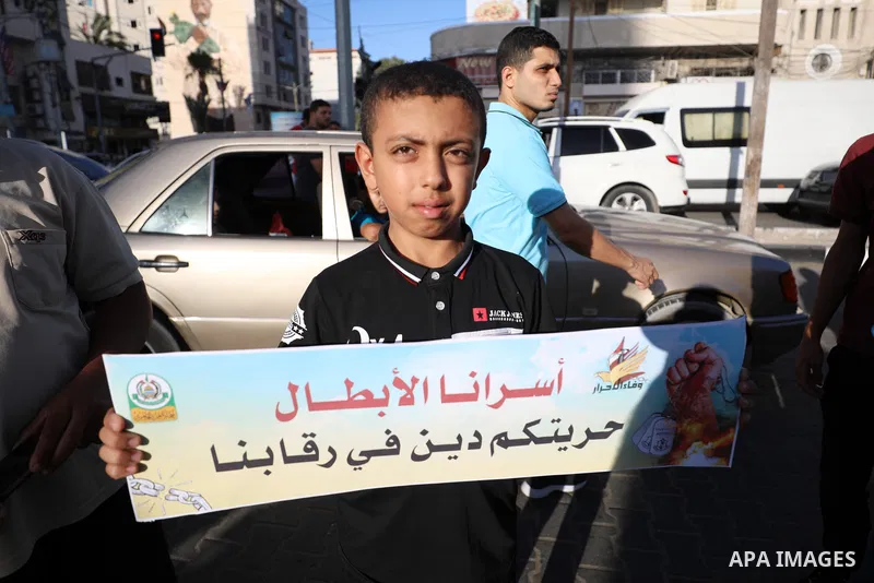 Palestinians take part in a rally ​on 10th anniversary of prisoners swap deal between Hamas and Israel, in Gaza city on October 17, 2021. October will mark a decade since the last major swap deal between Israel and Hamas...