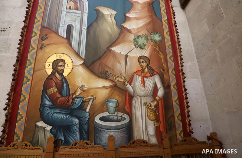 Christians attend prayers in the Church of Jacob's a deep well that has been associated in religious tradition with Biblical Jacob for roughly two thousand year in West Bank city of Nablus, on October 18, 2021. Jacob's W...