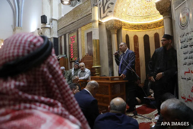 Palestinian Muslims celebrate during a festival of Eid-e-Milad-ul-Nabi, the birth anniversary of the Prophet Mohammad, at the Ibrahimi Mosque or the Tomb of the Patriarchs, in the West Bank city of Hebron on October 19,...