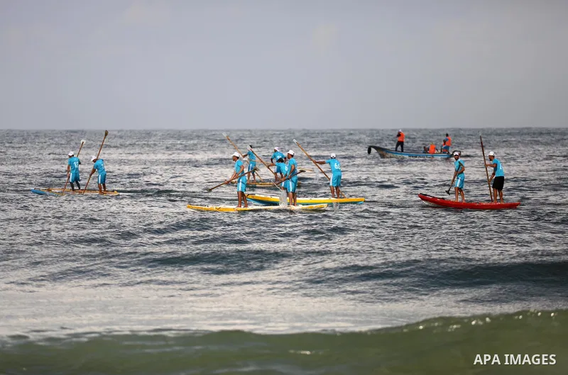 Palestinian players take part in the first sailing and rowing championship on the shore of the Mediterranean, in Gaza city, on Ocotber 20, 2021. The Palestinian Sailing and Rowing Federation organized the first sailing a...