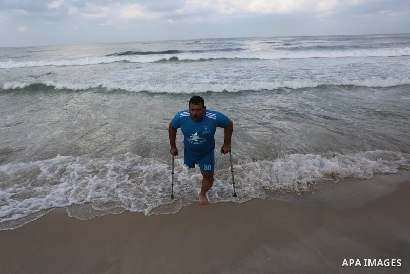 Palestinian players take part in the first sailing and rowing championship on the shore of the Mediterranean, in Gaza city, on Ocotber 20, 2021. The Palestinian Sailing and Rowing Federation organized the first sailing a...