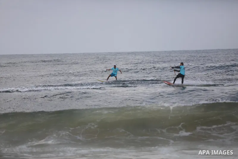 Palestinian players take part in the first sailing and rowing championship on the shore of the Mediterranean, in Gaza city, on Ocotber 20, 2021. The Palestinian Sailing and Rowing Federation organized the first sailing a...