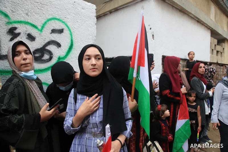 Freed Palestinian female prisoner Nisreen Abu Kamil, 46, is welcomed by her relatives at home in Gaza city, aftre Israel prevent her to enter into Gaza strip, on October 20, 2021. Israeli authorities released a Palestini...