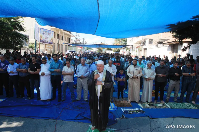 Palestinians attend Friday prayer in solidarity with prisoners on hunger strike at Israeli jails, in front of Red cross office in Gaza city on October 22, 2021. Israel is imprisoning some 4,650 Palestinian political pris...