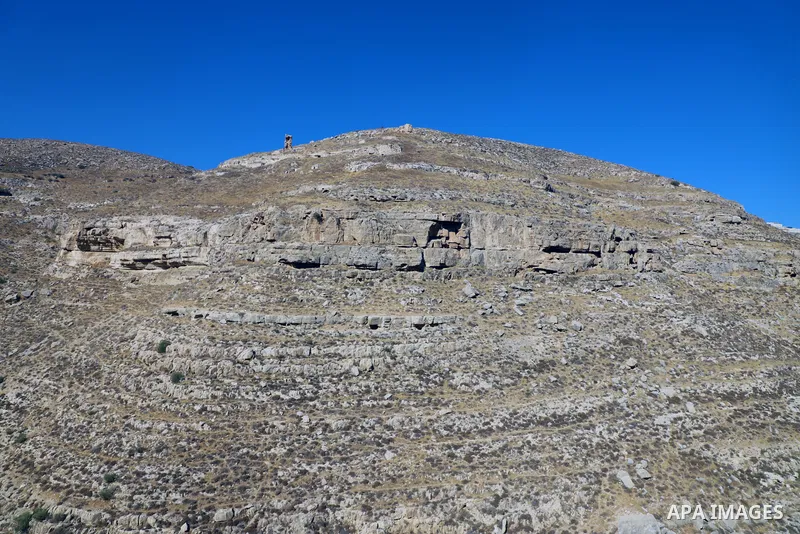 Palestinian adventurers walk amid dangerous cliffs during their journey to explore Valley and Cave of Saint Khreitoun near the West Bank city of Bethlehem, on October 25, 2021. To the southeast of Bethlehem, between the...