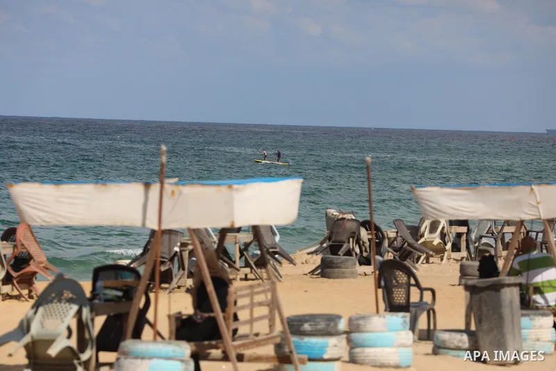 Palestinian fishermen collect fish nets on the beach of the Mediterranean sea in Gaza City, on October 23, 2021. Fishing is a major source of revenue for the impoverished Palestinian enclave. Israel, which maintains a bl...