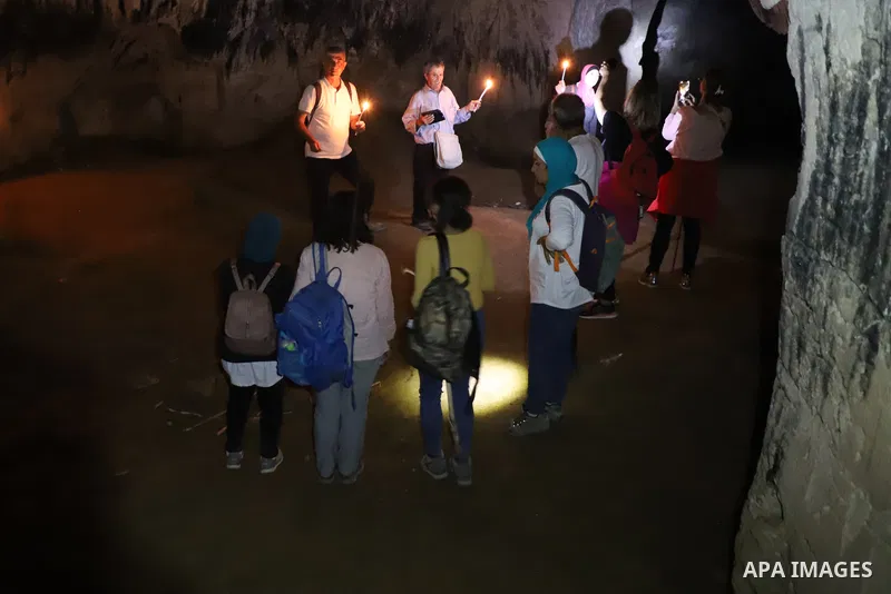 Palestinian adventurers walk amid dangerous cliffs during their journey to explore Valley and Cave of Saint Khreitoun near the West Bank city of Bethlehem, on October 25, 2021. To the southeast of Bethlehem, between the...