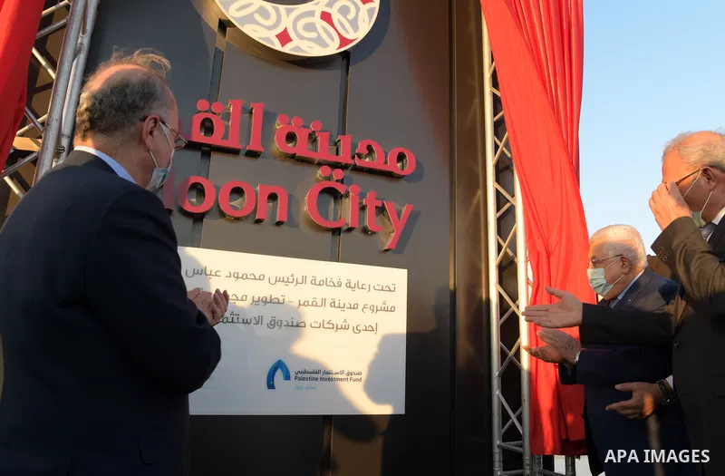 Palestinian President Mahmoud Abbas attend the opening of the city of the moon in the West Bank city of Jericho, on October 23, 2021. Photo by Thaer Ganaim