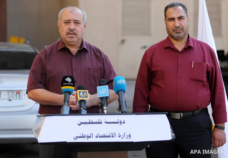 Osama Nofal, Director General of Studies at the Ministry of Economy in Gaza strip, speaks during a press conference in Gaza city on October 24, 2021. Photo by Ashraf Amra