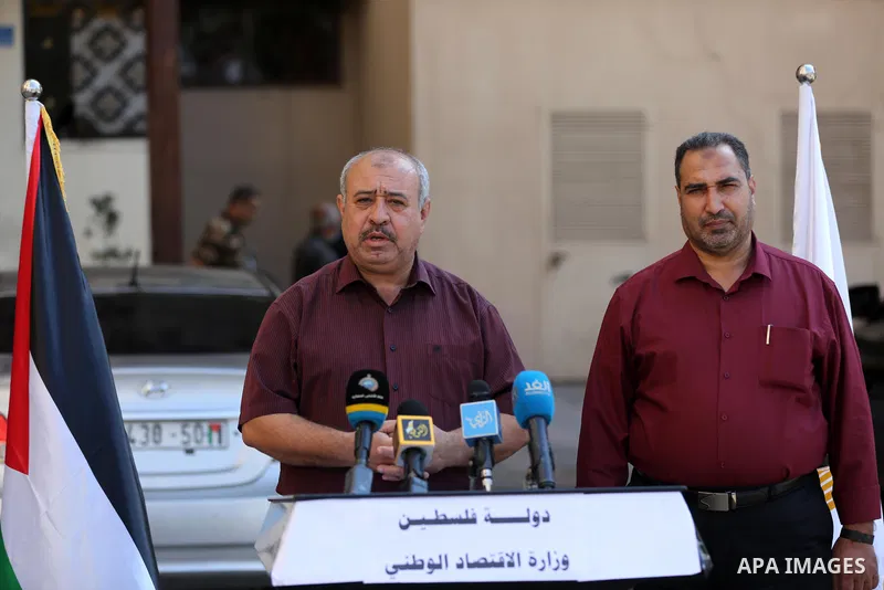 Osama Nofal, Director General of Studies at the Ministry of Economy in Gaza strip, speaks during a press conference in Gaza city on October 24, 2021. Photo by Ashraf Amra