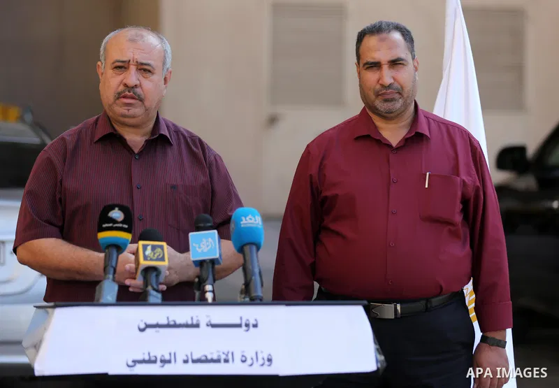 Osama Nofal, Director General of Studies at the Ministry of Economy in Gaza strip, speaks during a press conference in Gaza city on October 24, 2021. Photo by Ashraf Amra