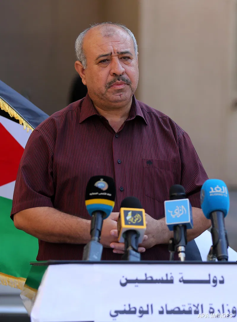 Osama Nofal, Director General of Studies at the Ministry of Economy in Gaza strip, speaks during a press conference in Gaza city on October 24, 2021. Photo by Ashraf Amra