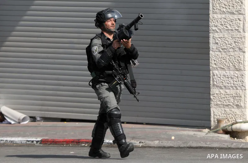 Palestinian protesters clash with Israeli forces following a demonstration calling for the release of Palestinian prisoners on hunger strike in Israeli jails, in the West Bank city of Hebron on October 24, 2021. Seven Pa...